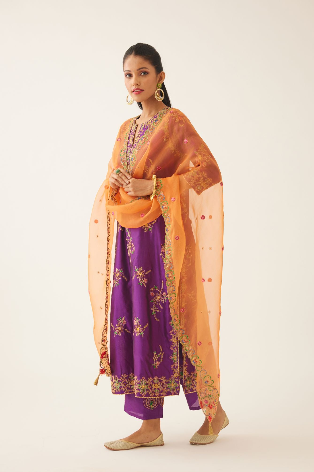 Plum purple straight silk kurta set with all over dori & silk thread embroidery highlighted with contrast bead & sequins work.