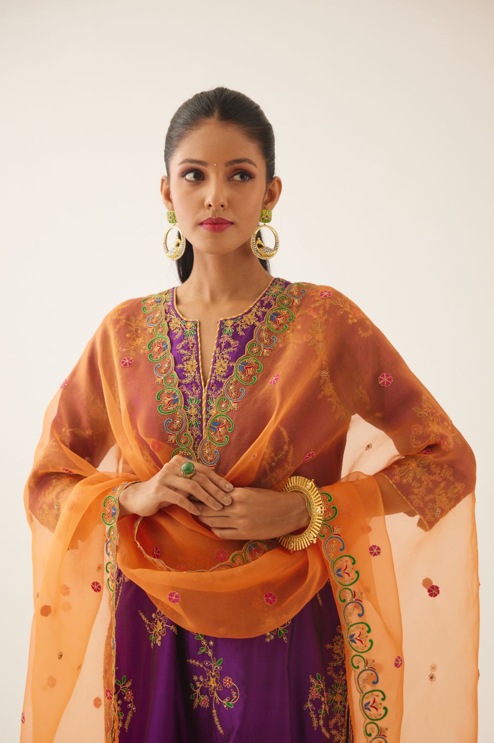 Plum purple straight silk kurta set with all over dori & silk thread embroidery highlighted with contrast bead & sequins work.
