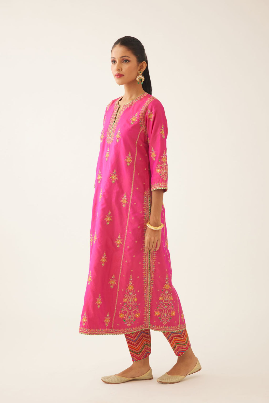 Raspberry silk kalidar straight kurta set with dori and silk thread embroidery, highlighted with bead and sequins work.
