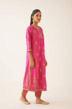 Raspberry silk kalidar straight kurta set with dori and silk thread embroidery, highlighted with bead and sequins work.