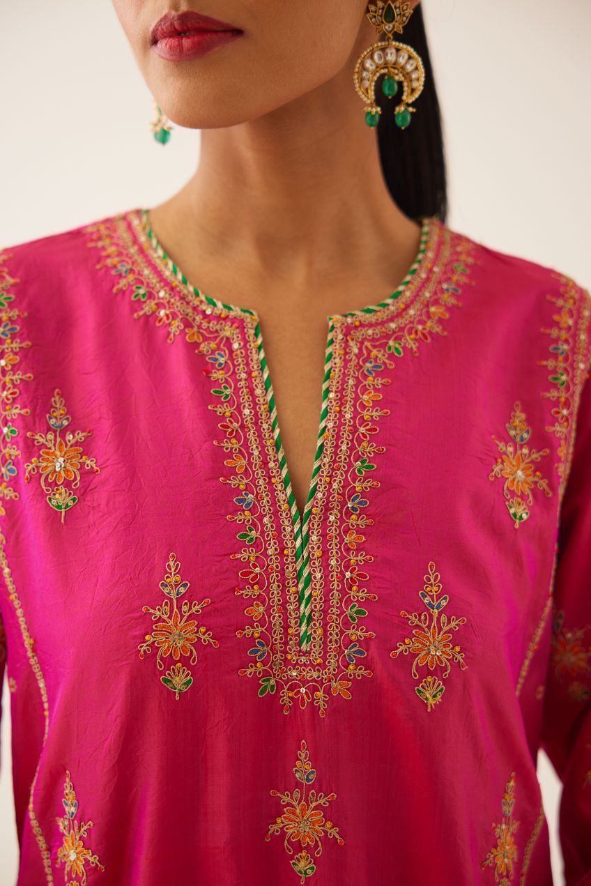Raspberry silk kalidar straight kurta set with dori and silk thread embroidery, highlighted with bead and sequins work.
