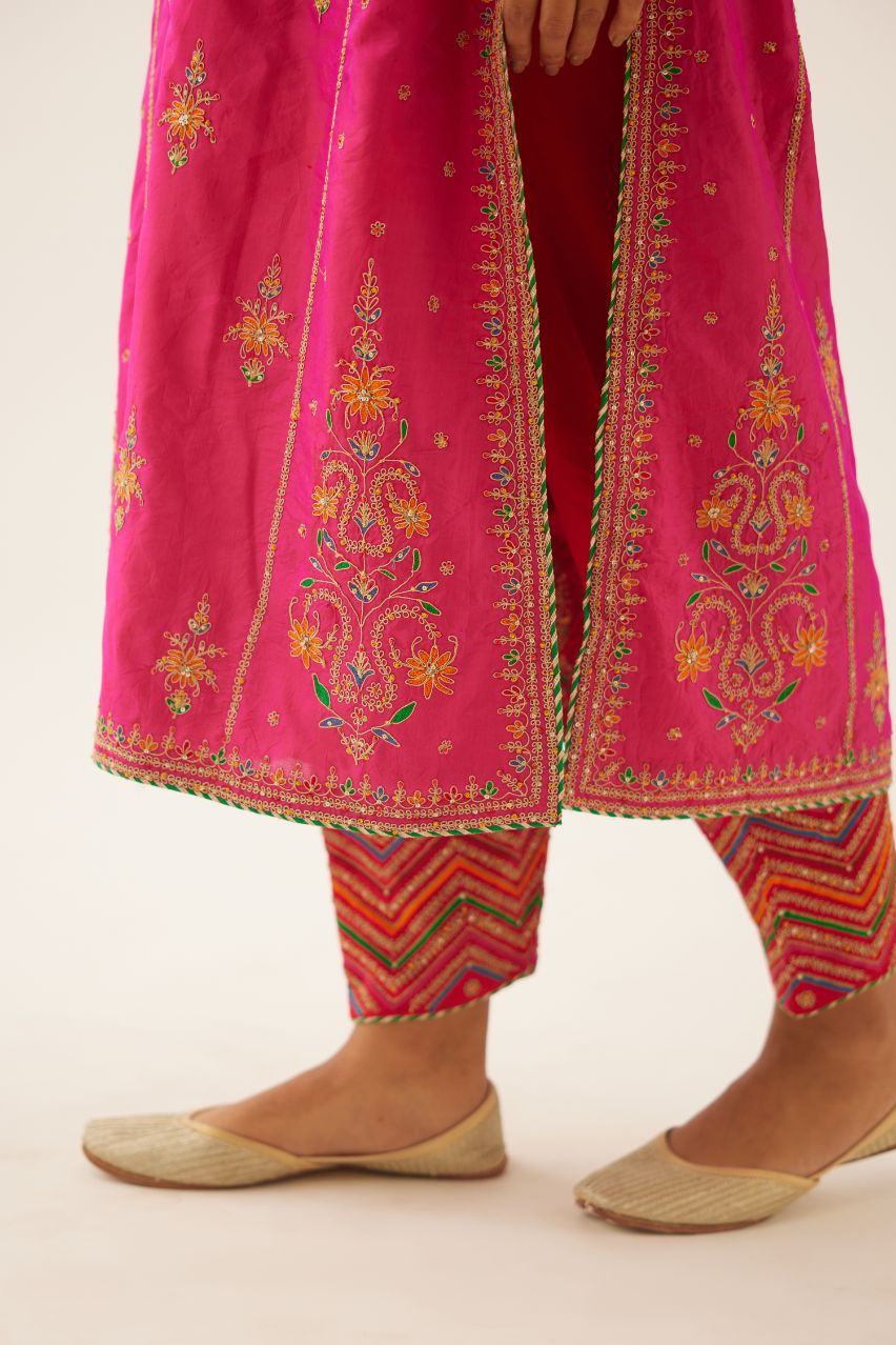 Raspberry silk kalidar straight kurta set with dori and silk thread embroidery, highlighted with bead and sequins work.