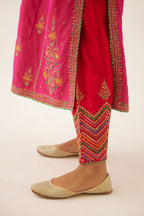 Raspberry silk kalidar straight kurta set with dori and silk thread embroidery, highlighted with bead and sequins work.