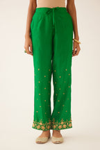 Green silk pants, hem is detailed with zari & gota embroidery