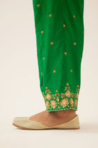 Green silk pants, hem is detailed with zari & gota embroidery