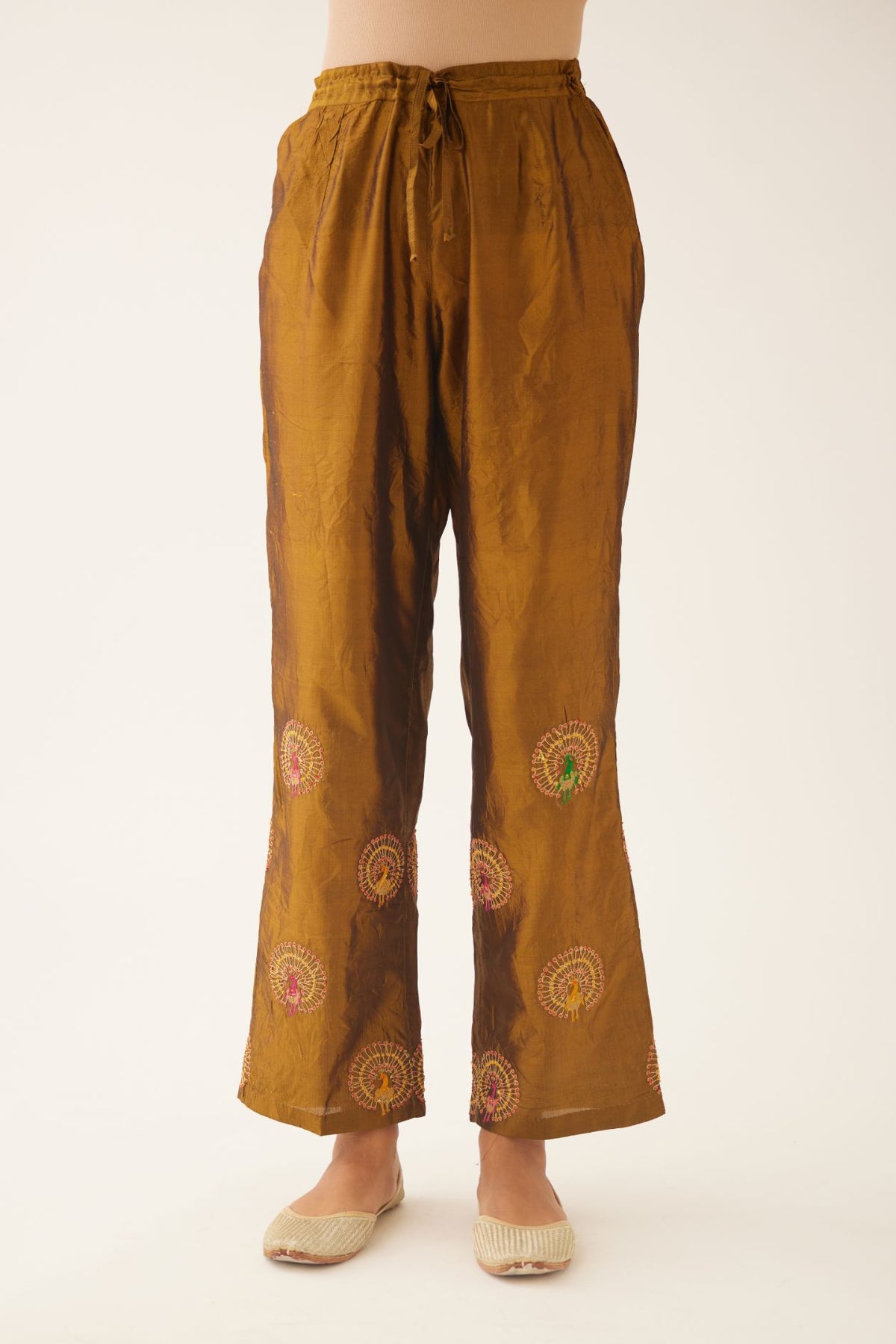 Golden olive silk straight pants with dori and silk thread embroidery.