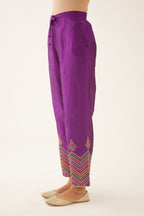 Plum purple silk pants detailed with dori, silk thread, bead & sequins embroidery.