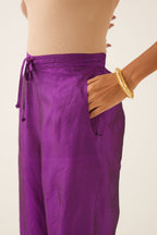 Plum purple silk pants detailed with dori, silk thread, bead & sequins embroidery.