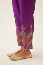 Plum purple silk pants detailed with dori, silk thread, bead & sequins embroidery.