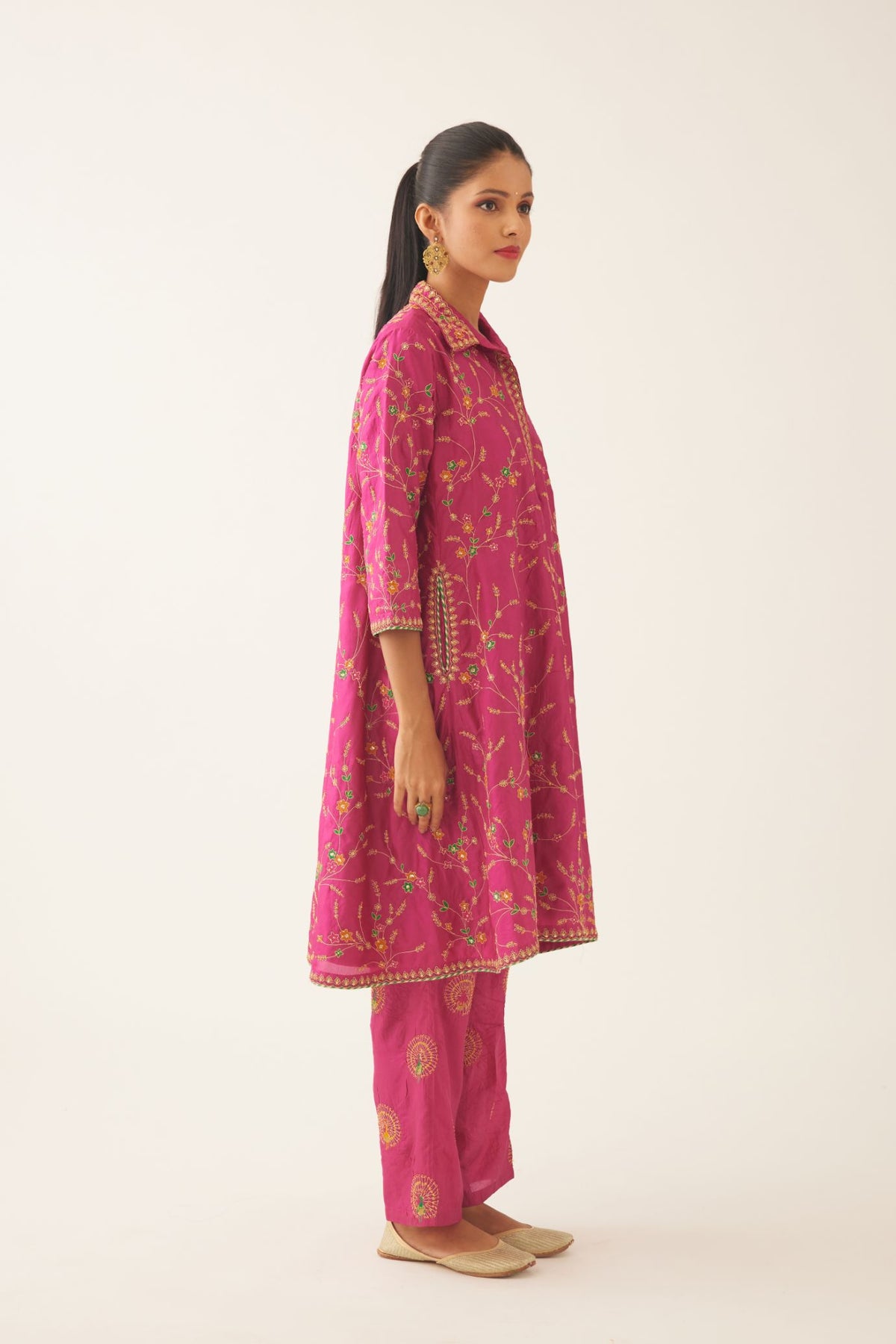 Jazz berry A-line short silk kurta set with all over embroidery, highlighted with sequins and bead work, paired with Jaz berry silk straight pants with dori and silk thread embroidery.