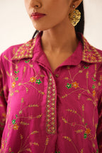 Jazz berry A-line short silk kurta set with all over embroidery, highlighted with sequins and bead work, paired with Jaz berry silk straight pants with dori and silk thread embroidery.