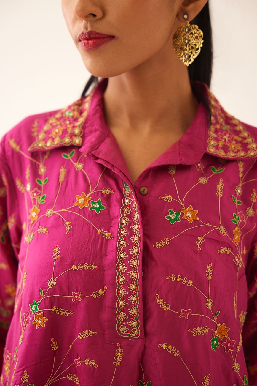 Jazz berry A-line short silk kurta set with all over embroidery, highlighted with sequins and bead work, paired with Jaz berry silk straight pants with dori and silk thread embroidery.