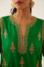 Green silk kalidar straight kurta set with dori and silk thread embroidery, highlighted with bead and sequins work.