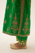 Green silk kalidar straight kurta set with dori and silk thread embroidery, highlighted with bead and sequins work.