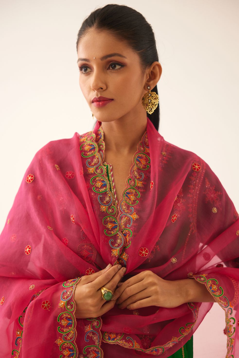 Green silk kalidar straight kurta set with dori and silk thread embroidery, highlighted with bead and sequins work.
