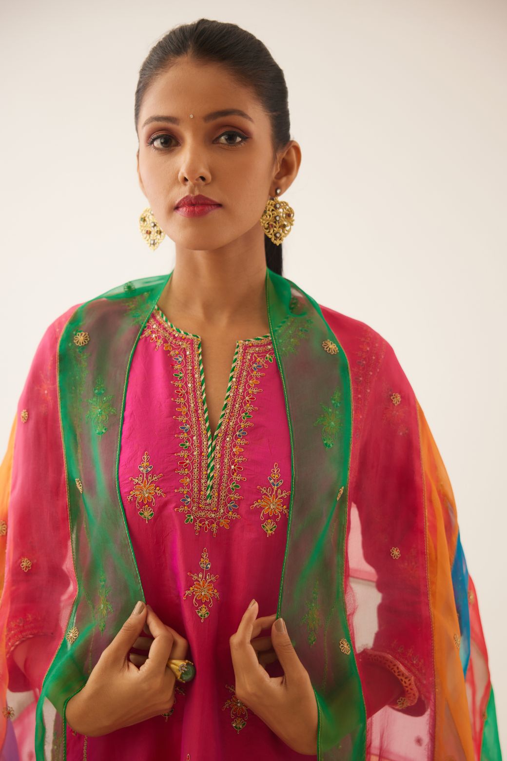 Raspberry silk kalidar straight kurta set with dori and silk thread embroidery, highlighted with bead and sequins work.