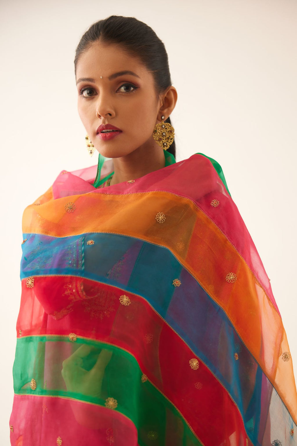 Multi colored silk organza dupatta with all-over delicate dori & silk thread embroidery, highlighted with bead and sequins work.