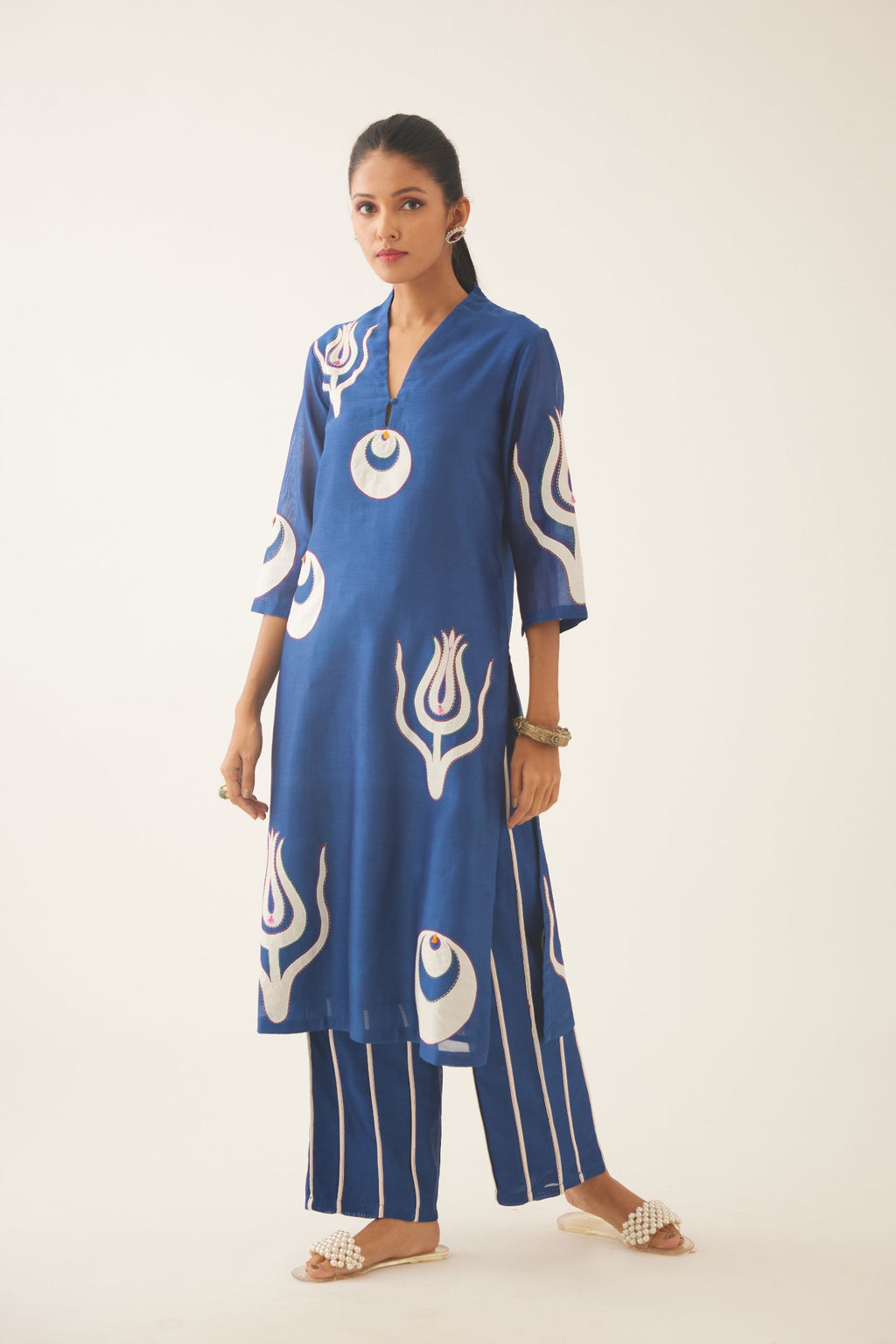 Blue silk chanderi straight kurta set with cotton appliqué boota, highlighted with kantha multi colored thread work.