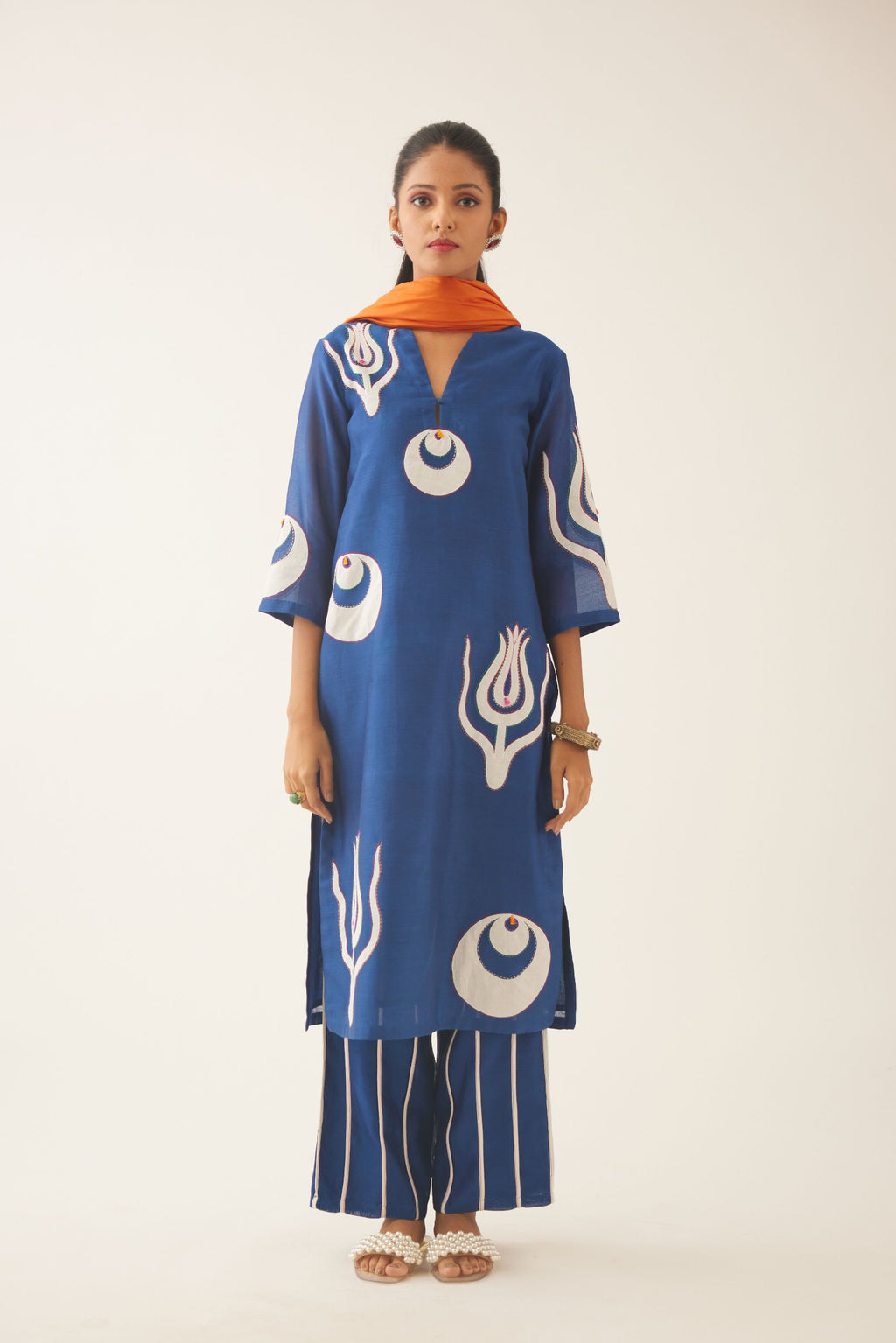Blue silk chanderi straight kurta set with cotton appliqué boota, highlighted with kantha multi colored thread work.