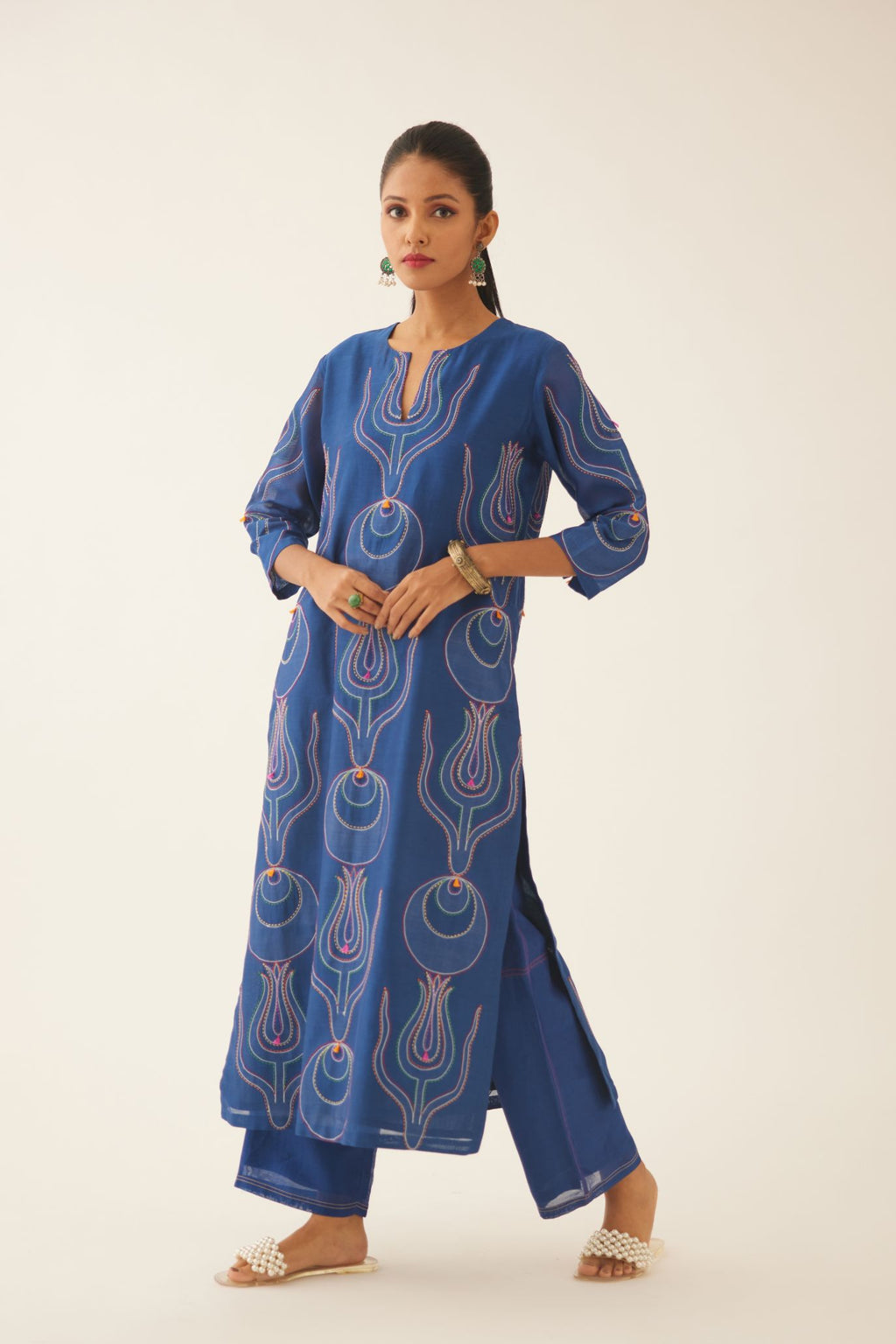 Blue silk chanderi straight kurta set with all-over cotton appliqué work at reverse side, highlighted with kantha work in front side with multi colored thread.