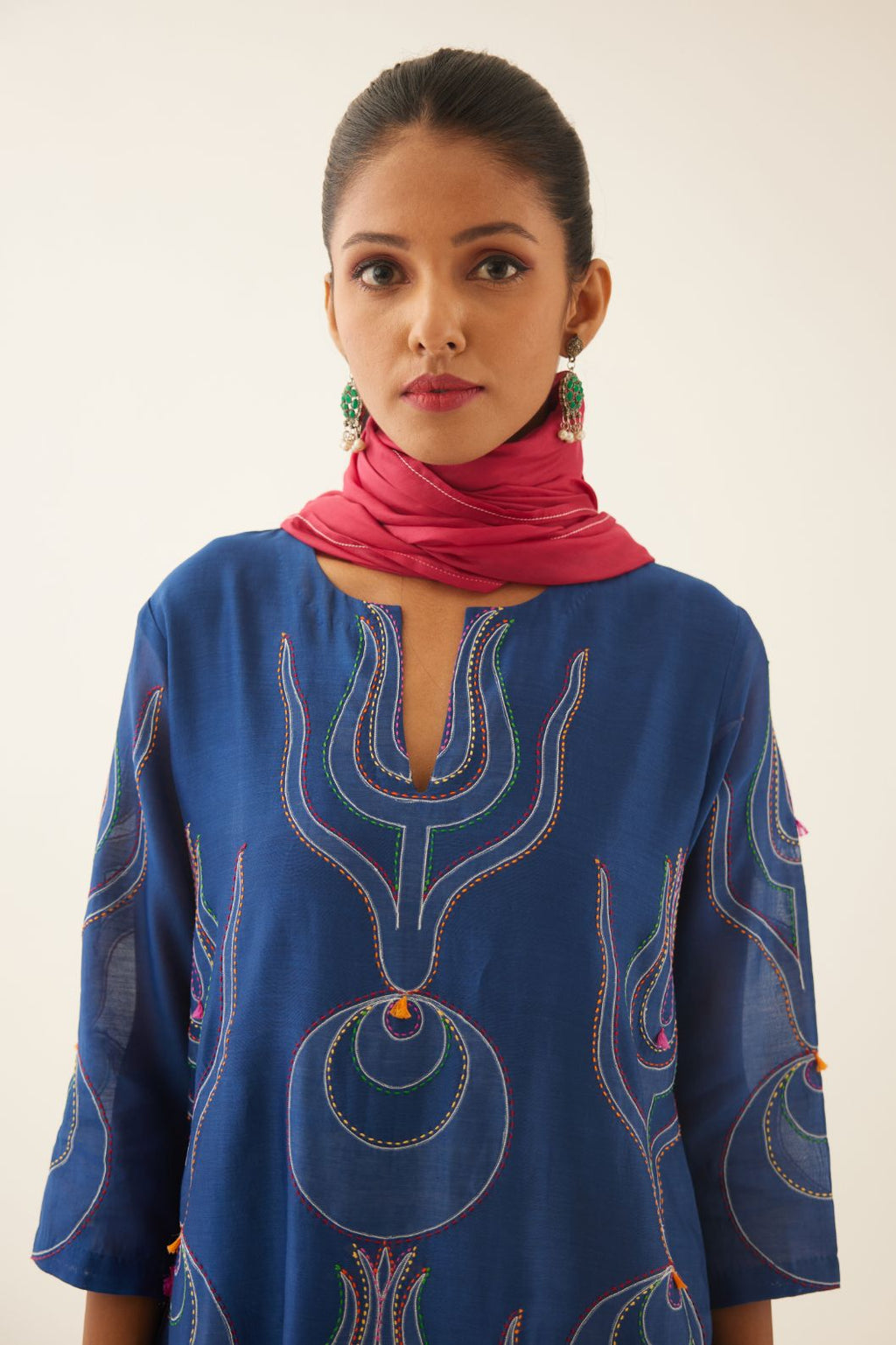 Blue silk chanderi straight kurta set with all-over cotton appliqué work at reverse side, highlighted with kantha work in front side with multi colored thread.