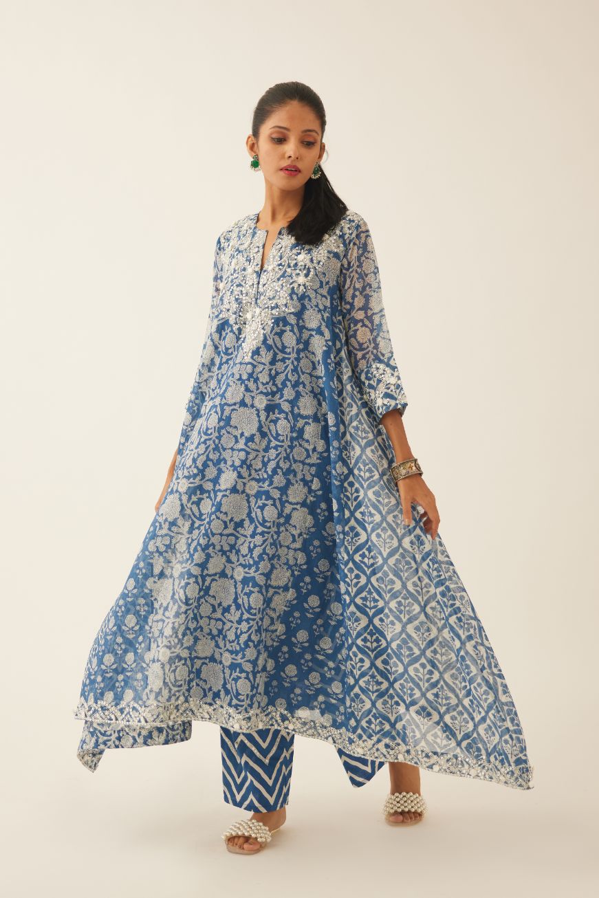 Blue hand block printed easy fit, asymmetric hem, paneled kurta set with sequins, tassels and bead work.