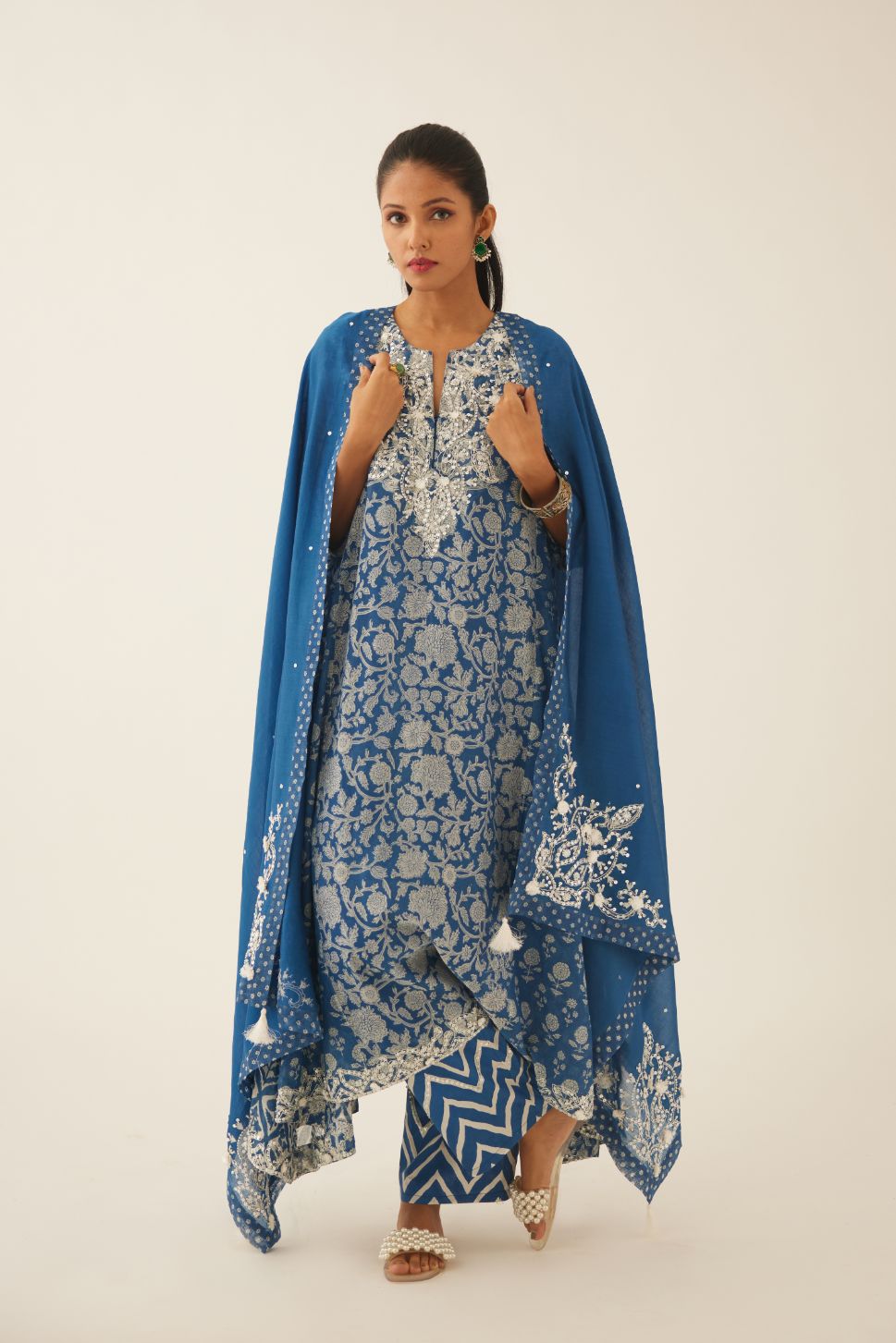 Blue hand block printed easy fit, asymmetric hem, paneled kurta set with sequins, tassels and bead work.