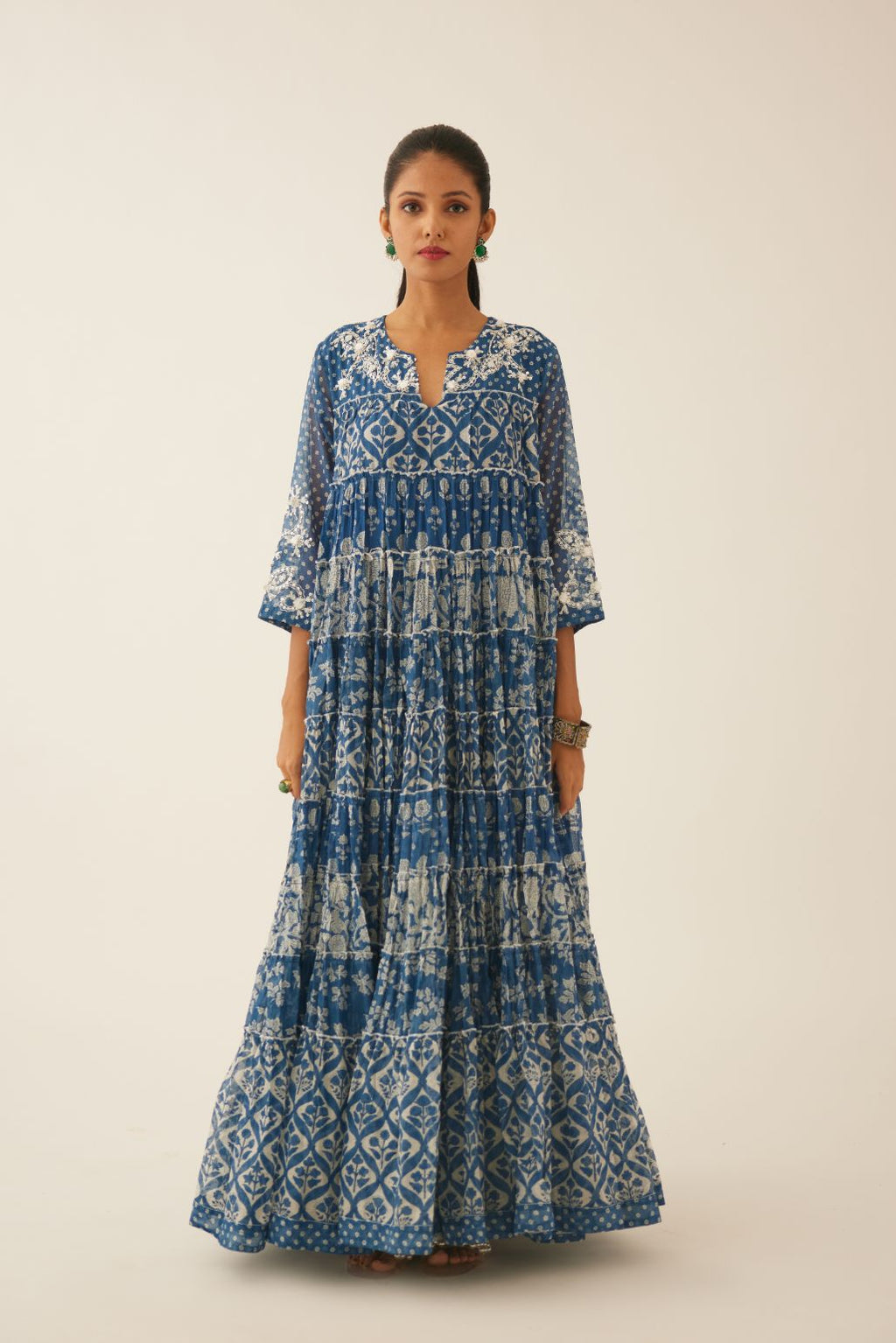 Blue hand block printed multi-tiered kurta dress set with 3/4 sleeves, highlighted with sequins, tassels and bead work.