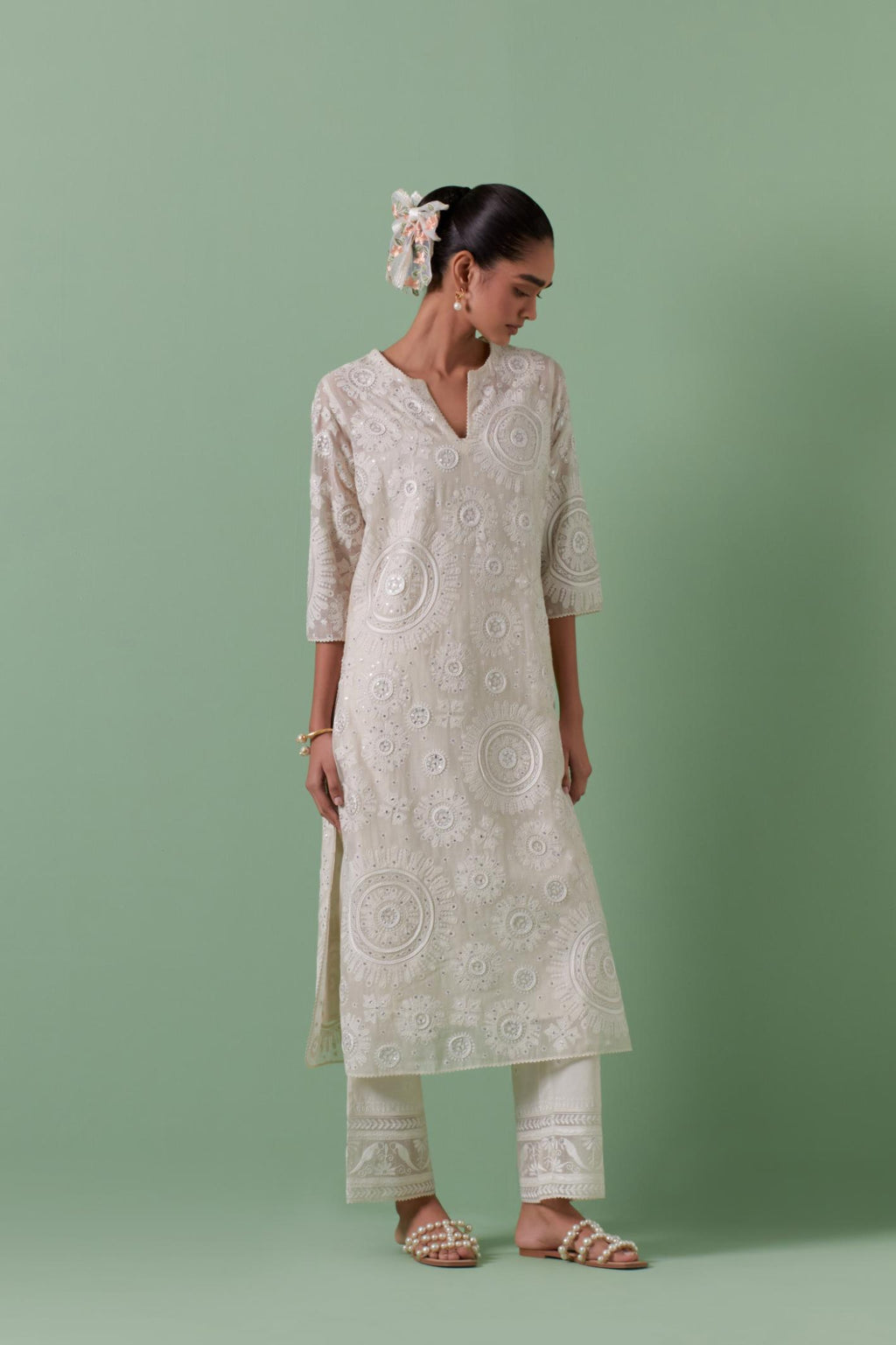 Off-white cotton chanderi straight kurta set with all over patchwork, silk thread, mirror, tassels embroidery and sequins.