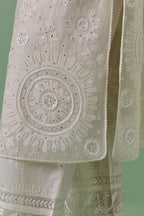 Off-white cotton chanderi straight kurta set with all over patchwork, silk thread, mirror, tassels embroidery and sequins.