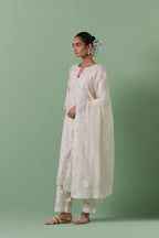 Off-white cotton chanderi dupatta with delicate silk thread embroidery, highlighted with braids, mirrors and sequins.