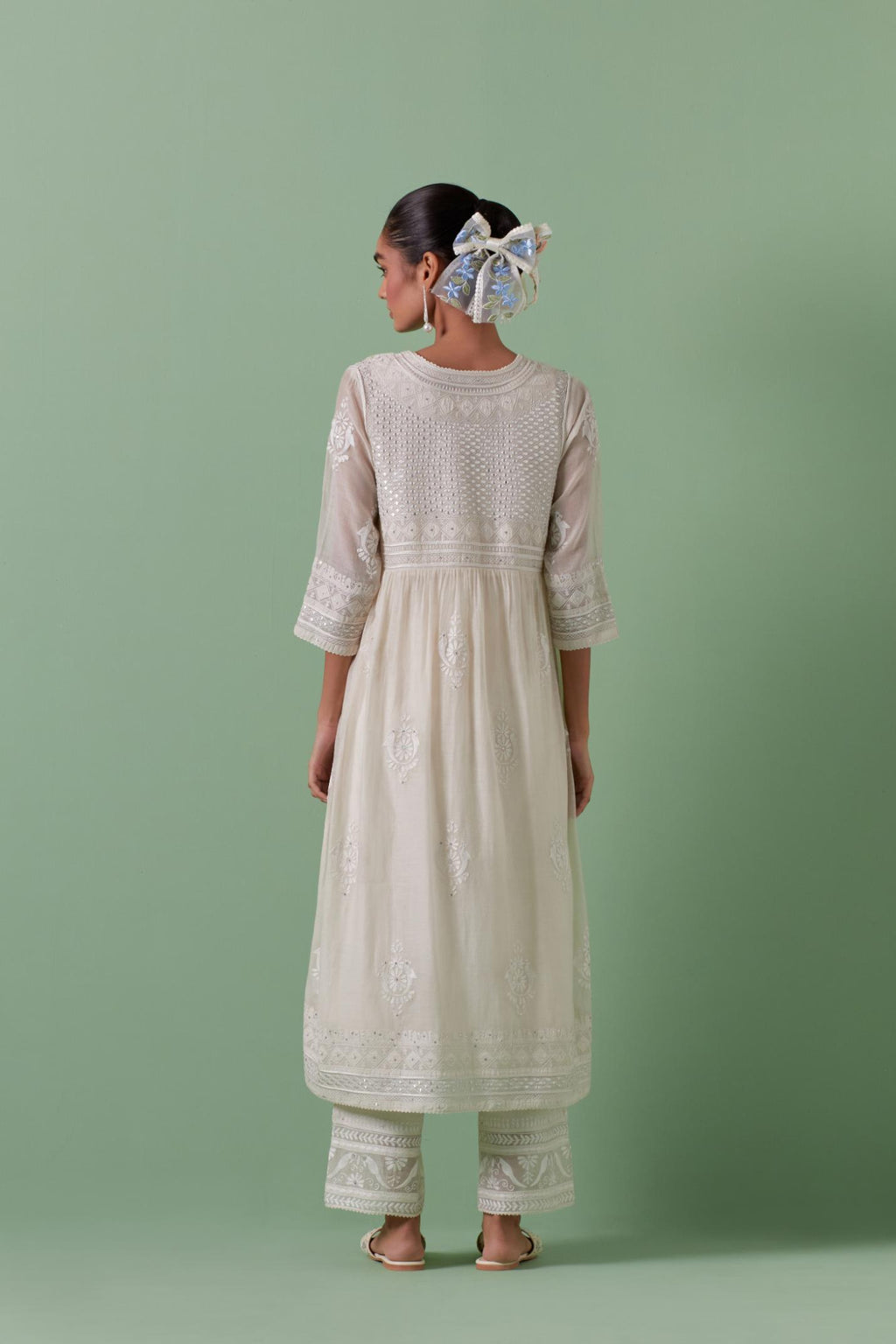 Off-white cotton chanderi embroidered kurta set dress with V neck, yoke and fine gathers at empire line.