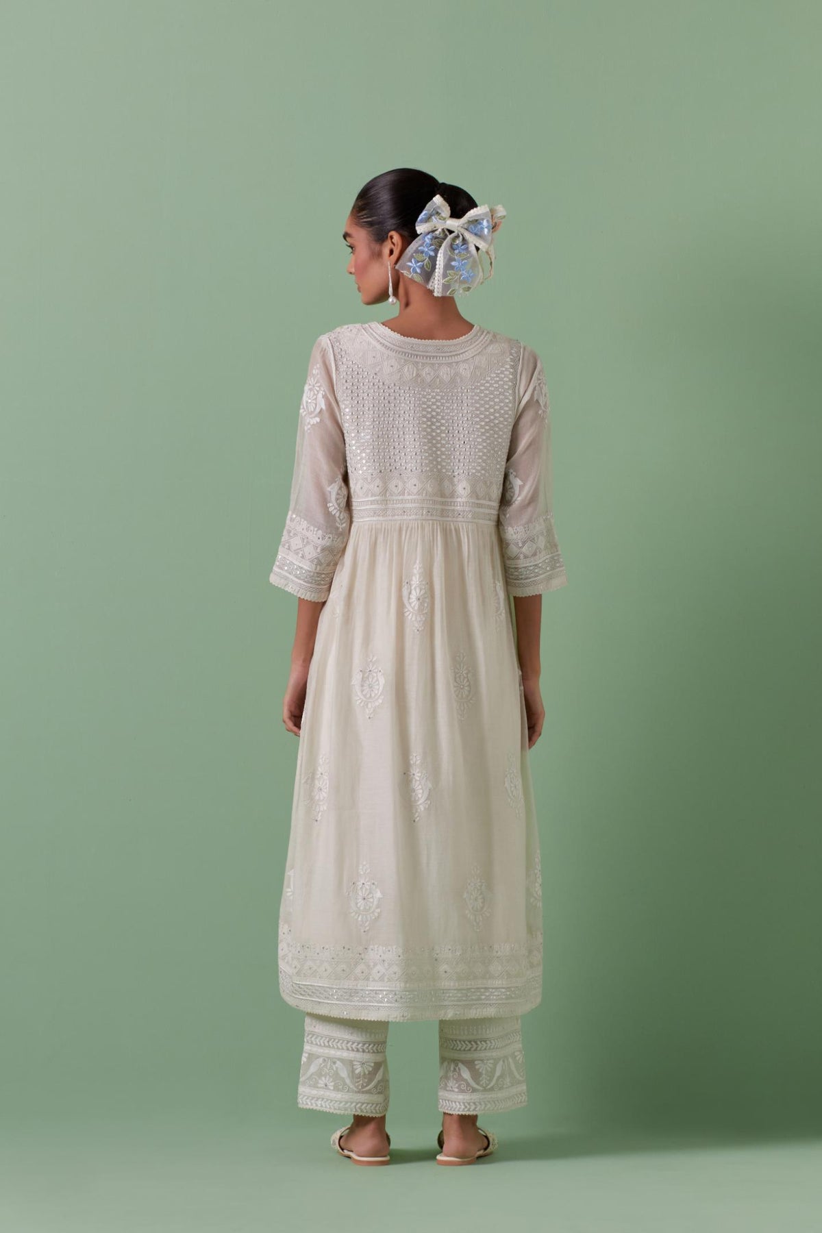 Off-white cotton chanderi embroidered kurta set dress with V neck, yoke and fine gathers at empire line.