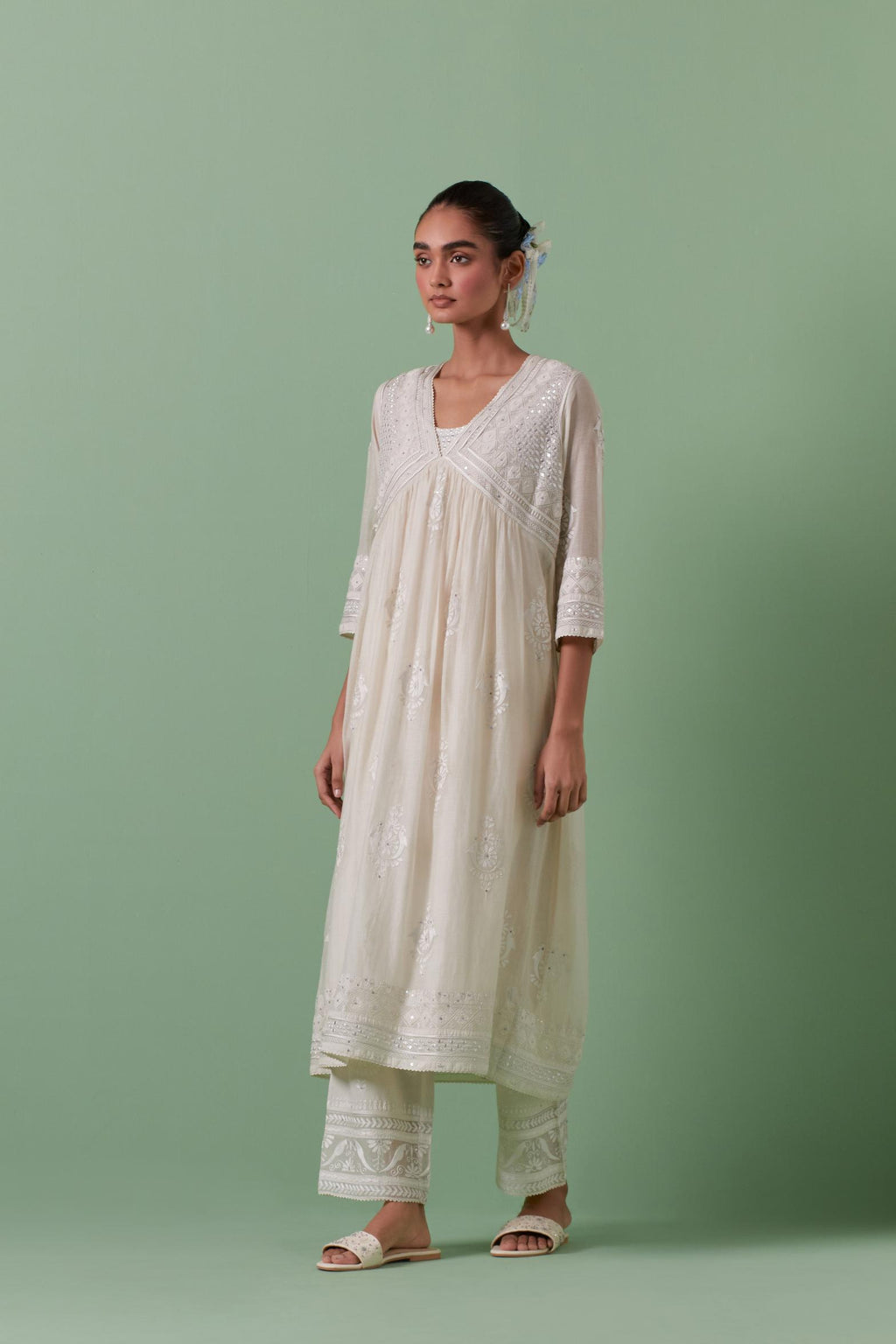 Off-white cotton chanderi embroidered kurta set dress with V neck, yoke and fine gathers at empire line.