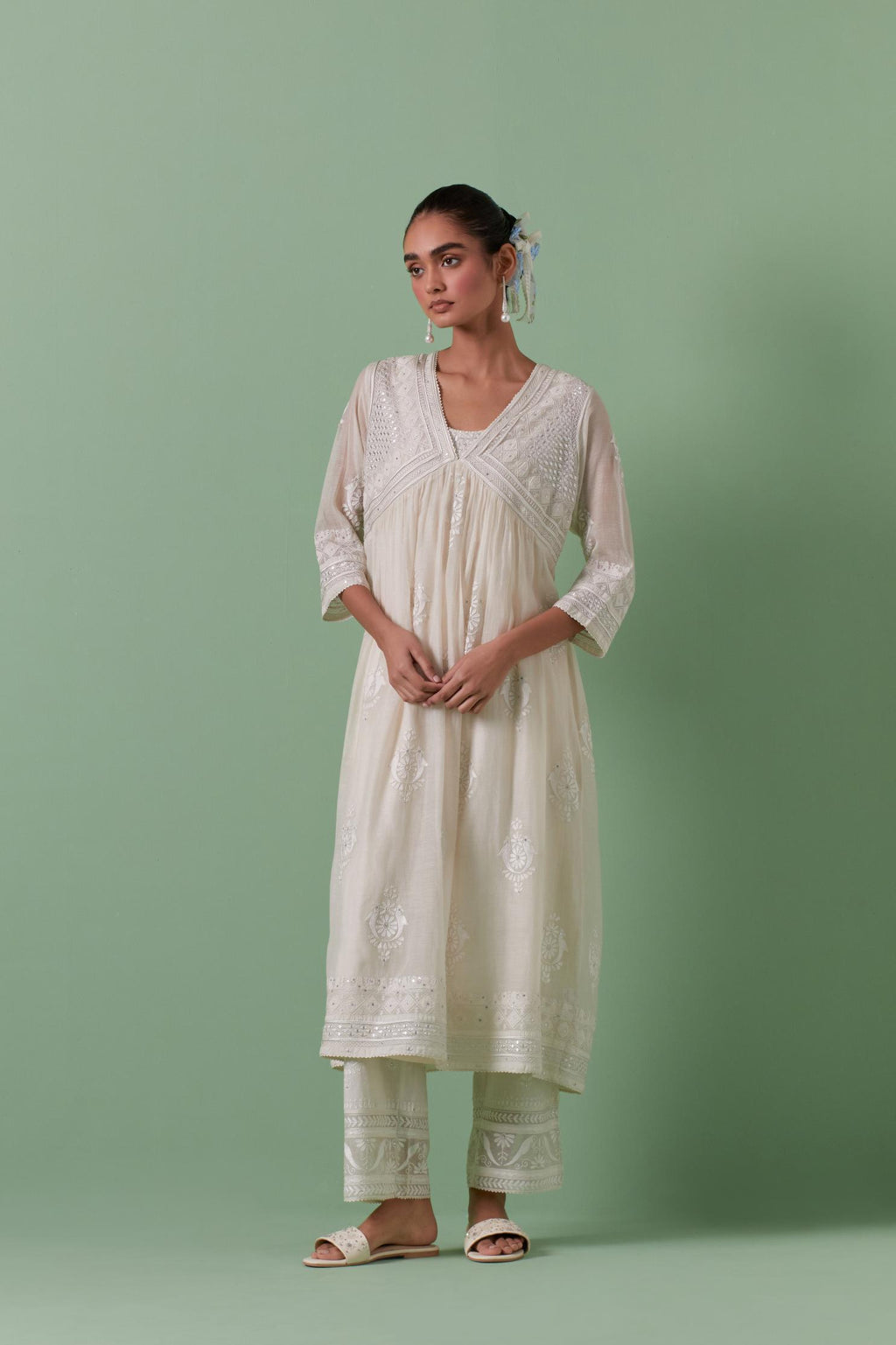 Off-white cotton chanderi embroidered kurta set dress with V neck, yoke and fine gathers at empire line.