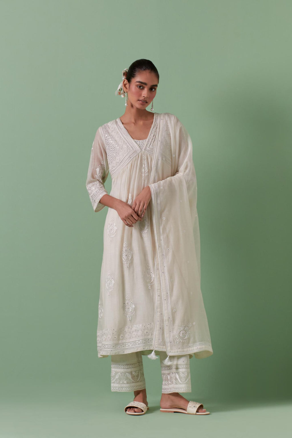 Off-white cotton chanderi embroidered kurta set dress with V neck, yoke and fine gathers at empire line.