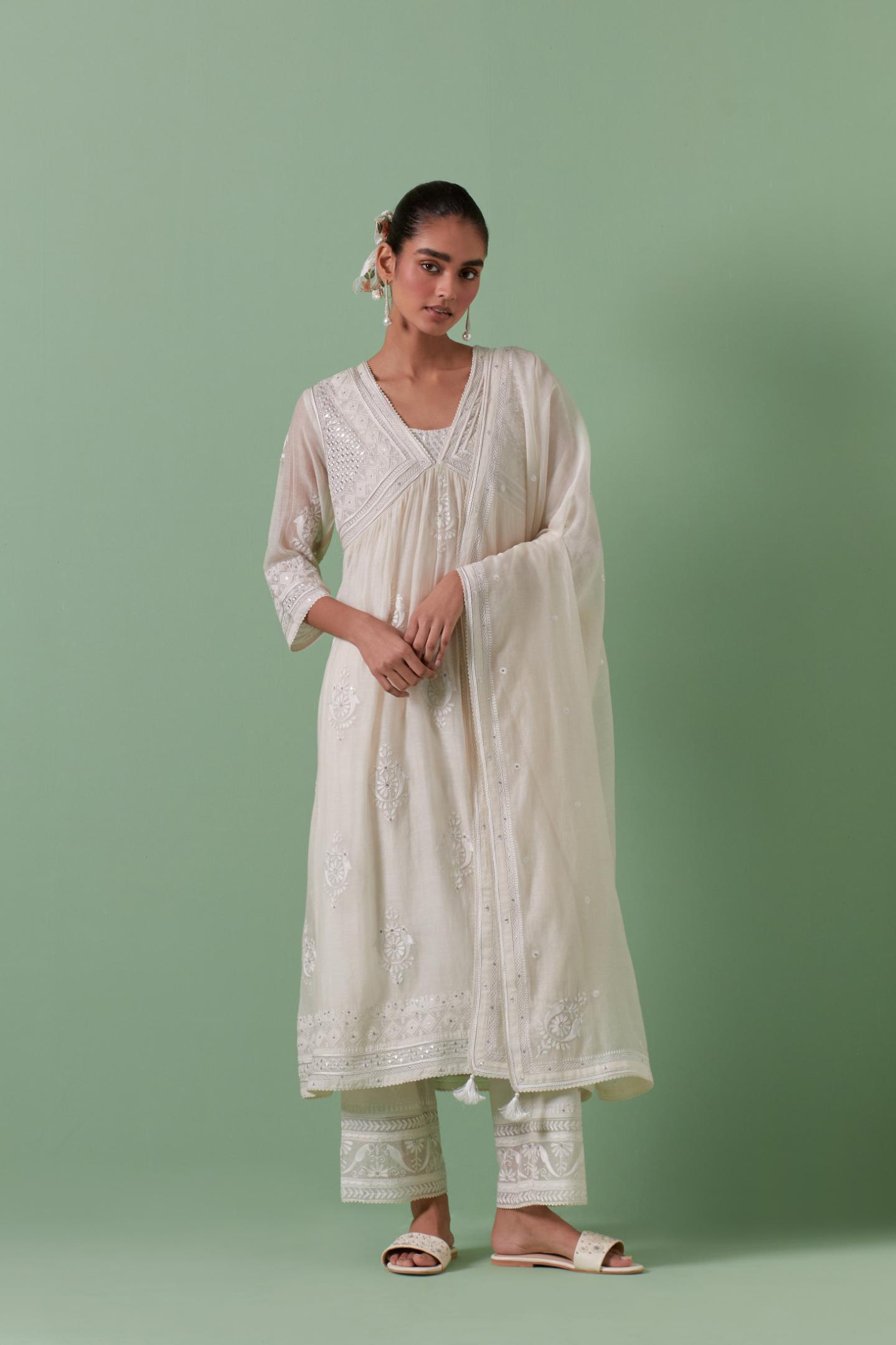 Off-white cotton chanderi embroidered kurta set dress with V neck, yoke and fine gathers at empire line.