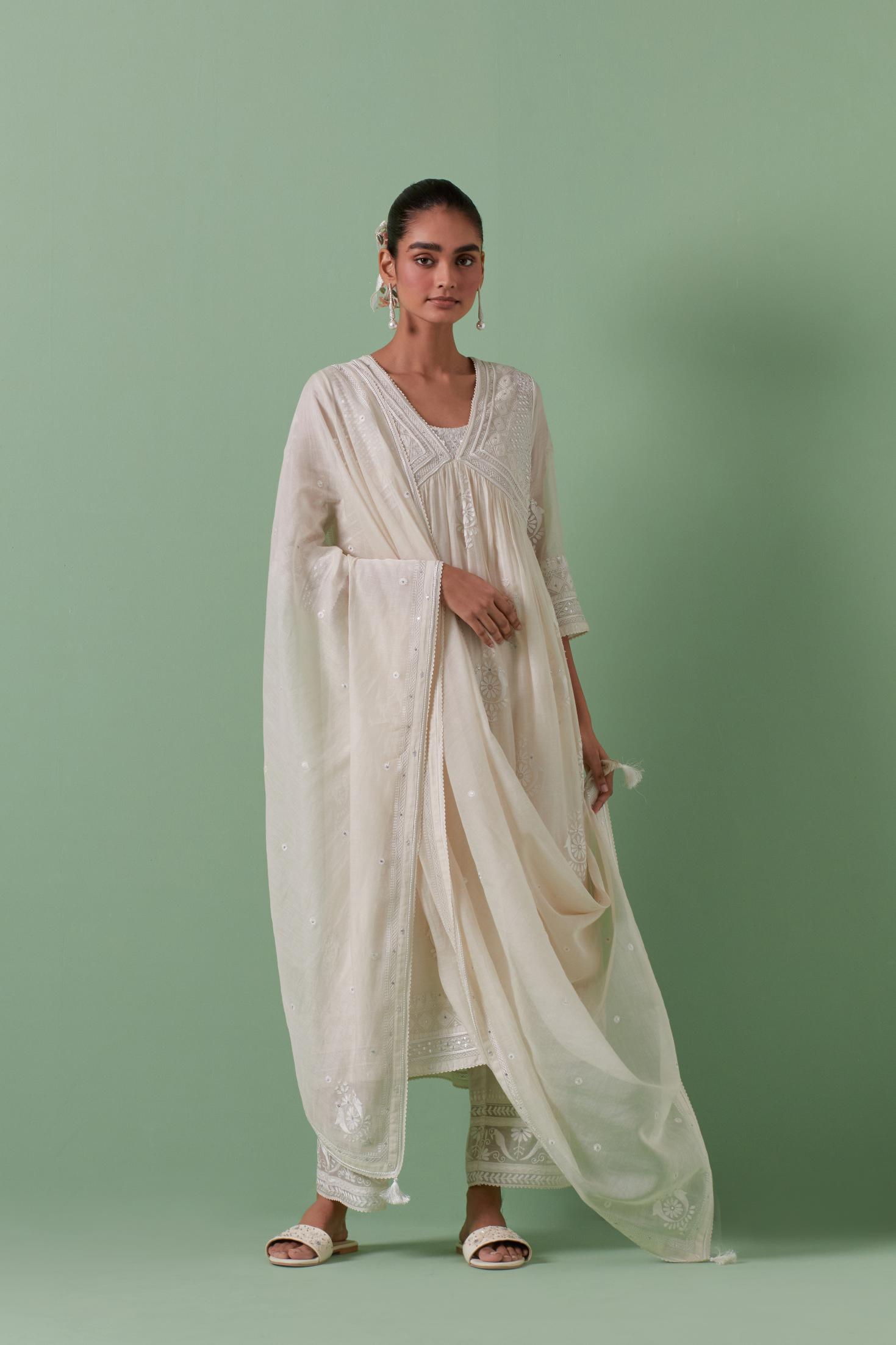 Off-white cotton chanderi embroidered kurta set dress with V neck, yoke and fine gathers at empire line.