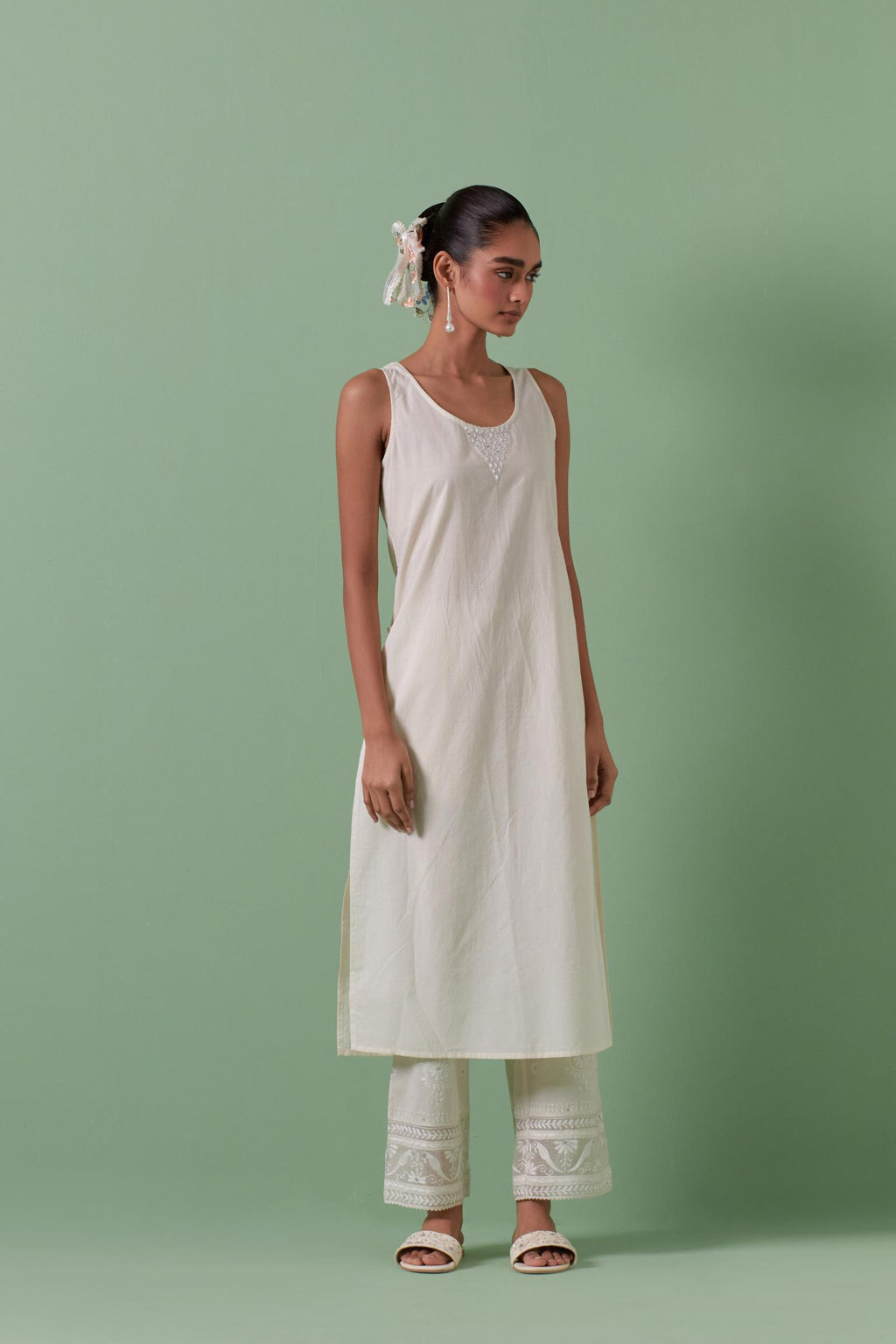 Off-white cotton chanderi embroidered kurta set dress with V neck, yoke and fine gathers at empire line.
