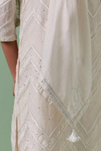 Off-white cotton chanderi A-line kurta set with all over embroidery set in bold chevron stripes.