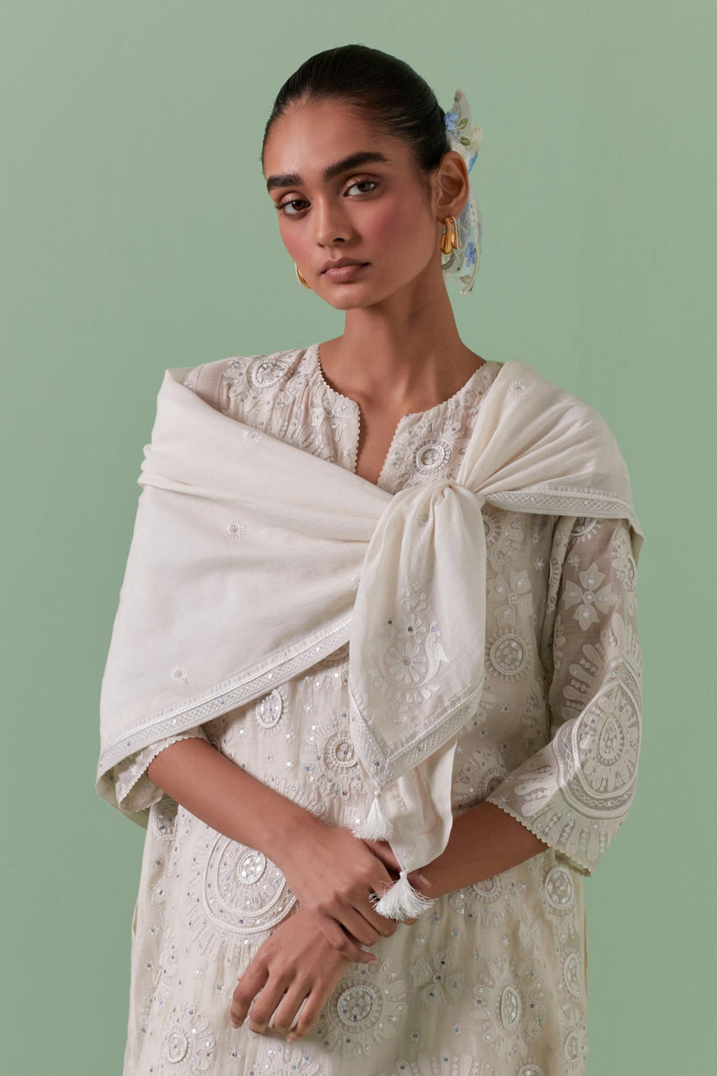 Off-white A-line cotton chanderi kurta set with all over patchwork, silk thread, mirror, tassels embroidery and sequins.