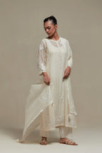 Off white straight kurta set with all-over appliqué motifs, highlighted with sequins and beads.