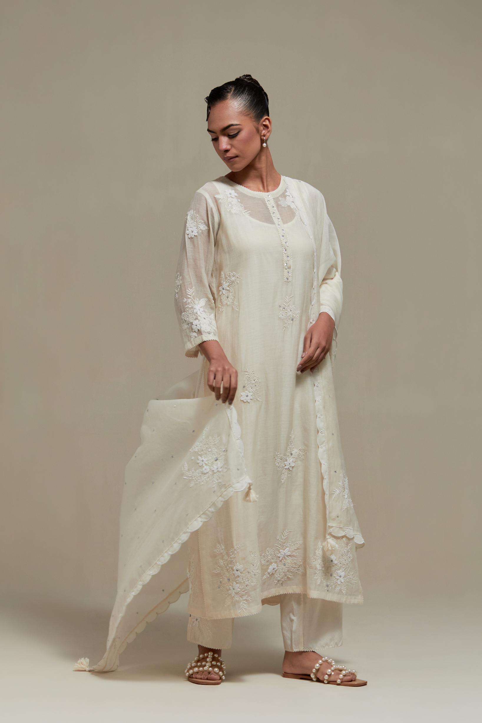 Off white straight kurta set with all-over appliqué motifs, highlighted with sequins and beads.