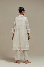 Off white cotton Chanderi short shirt-kurta set with all-over appliqué flowers, highlighted with sequins and beads.