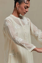 Off white cotton Chanderi short kurta set with all-over appliqué, highlighted with sequins and beads.