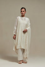 Off white cotton Chanderi short kurta set with all-over appliqué, highlighted with sequins and beads.