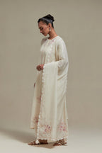 Off white cotton Chanderi dupatta, highlighted with all-over delicate sequins flower and pink & beige hand block printed appliqué motifs at dupatta corners.
