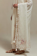 Off white cotton Chanderi dupatta, highlighted with all-over delicate sequins flower and pink & beige hand block printed appliqué motifs at dupatta corners.