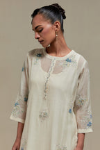 Off white straight kurta set with all-over blue & beige hand block printed appliqué motifs, highlighted with sequins and multi coloured beads.