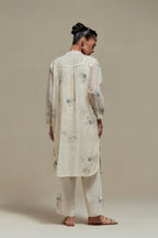 Off white cotton Chanderi short kurta set with all-over blue & beige hand block printed appliqué, highlighted with sequins and multi coloured beads.